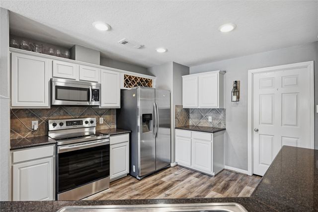 9414 Sagehampton Court, Spring, TX 77379