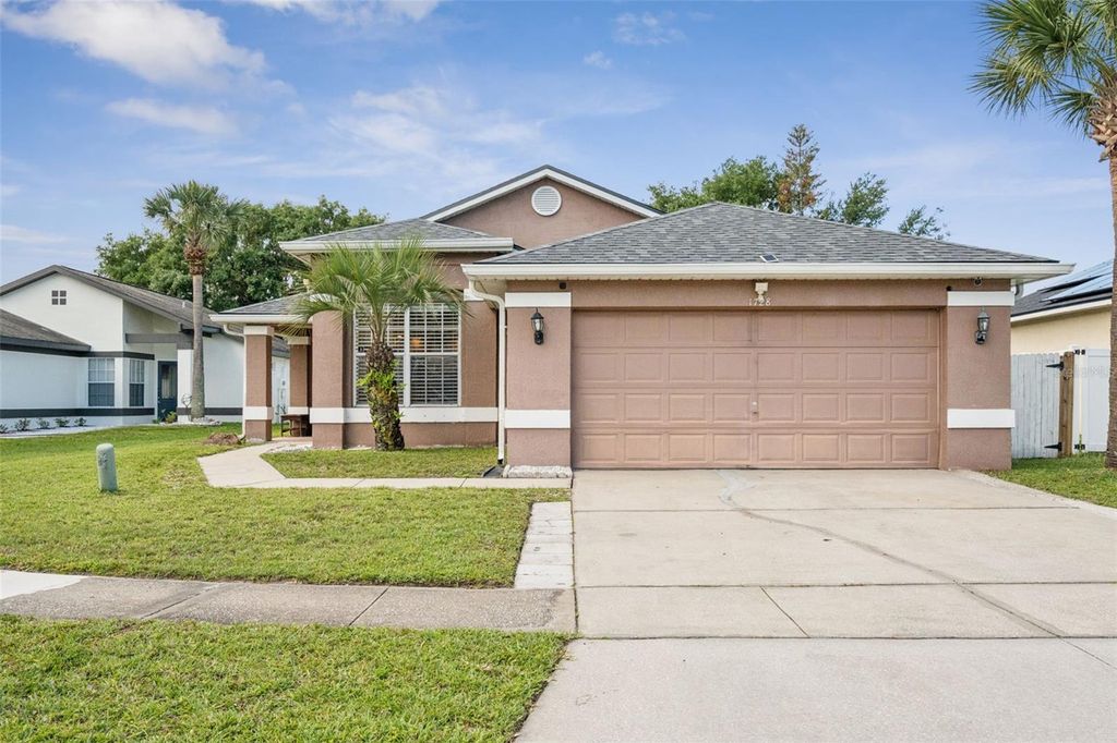 Image 1 of property listing at 1728 BROOK HOLLOW DRIVE, Orlando, FL 32824