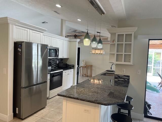 618 SE STREAMLET Avenue, Port St. Lucie, FL 34983