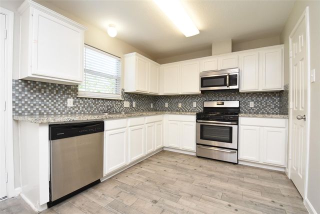 21603 Falvel Lake Drive, Spring, TX 77388