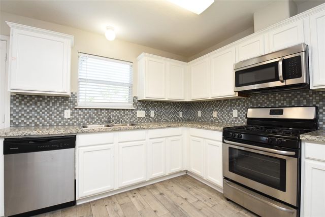 21603 Falvel Lake Drive, Spring, TX 77388
