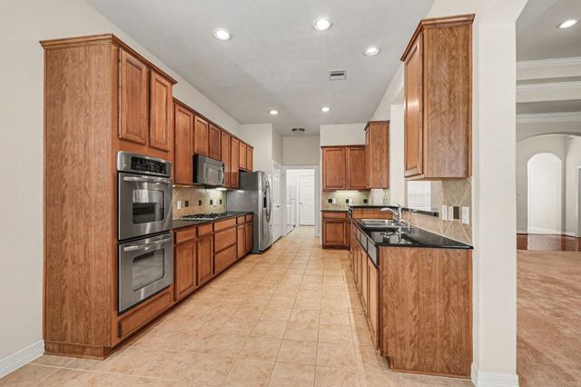 9318 Caddo Springs Court, Cypress, TX 77433