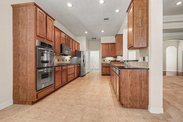 9318 Caddo Springs Court, Cypress, TX 77433