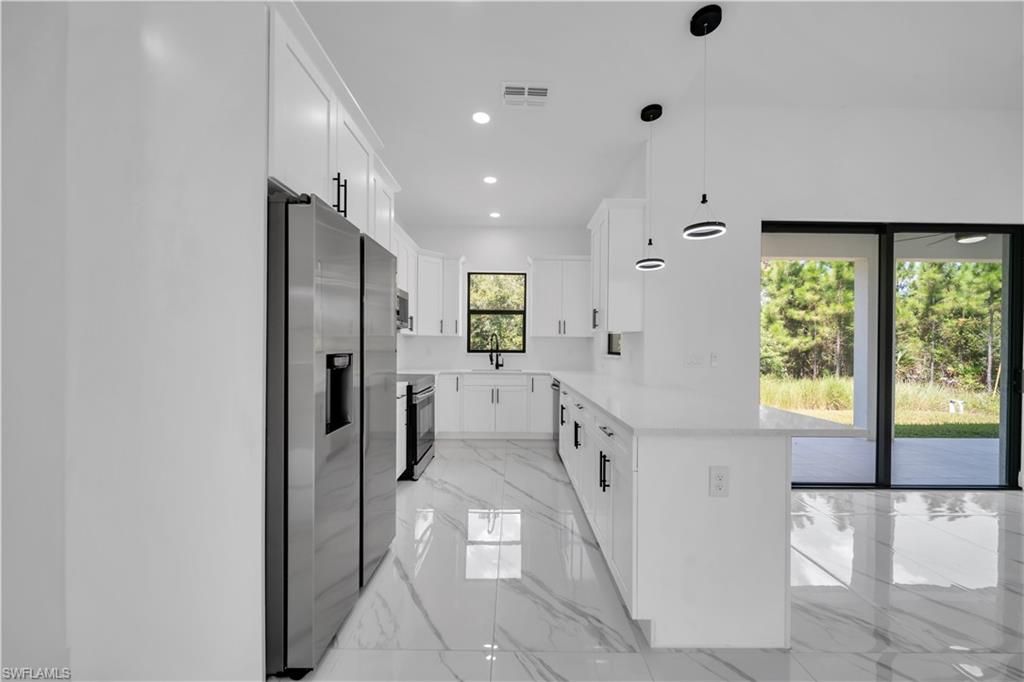 505 E 9TH ST, LEHIGH ACRES, FL 33972 — photo 4