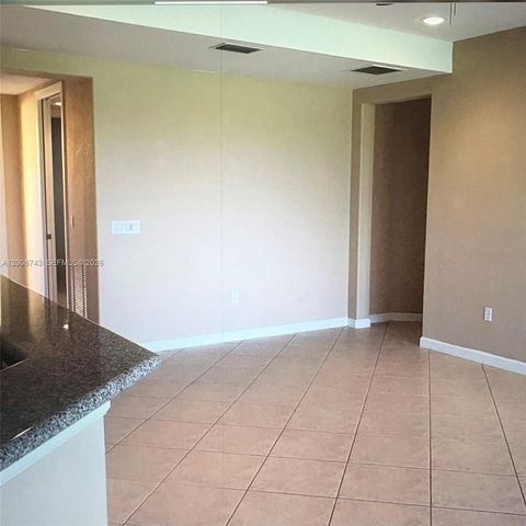 7993 NW 128th Ln 13-B, Parkland, FL 33076
