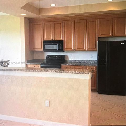 7993 NW 128th Ln 13-B, Parkland, FL 33076