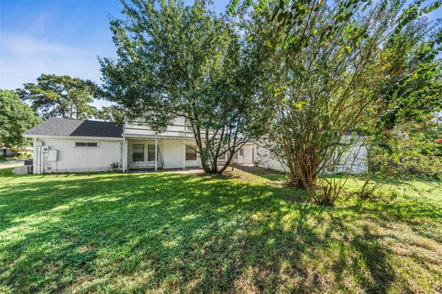 8911 Pine Shores Drive, Humble, TX 77346