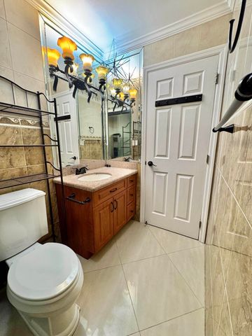 6074 FOREST HILL Boulevard 107, West Palm Beach, FL 33415