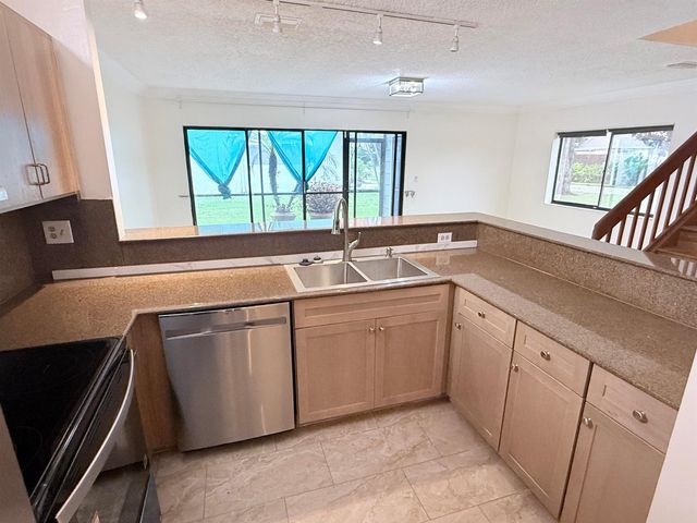 1635 Woodbridge Lakes Circle, West Palm Beach, FL 33406