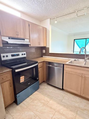 1635 Woodbridge Lakes Circle, West Palm Beach, FL 33406