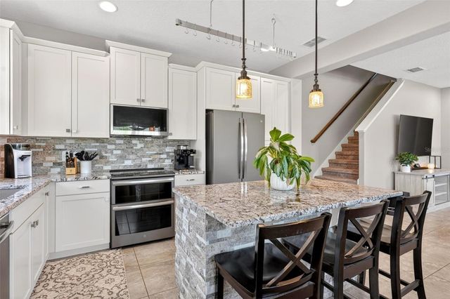 7875 GAMEMASTER AVENUE, Orlando, FL 32832