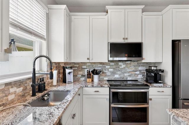 7875 GAMEMASTER AVENUE, Orlando, FL 32832