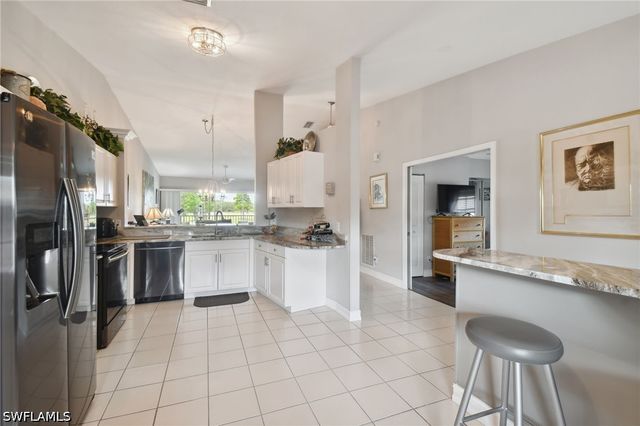 9165 Michael CIR 1002, Naples, FL 34113
