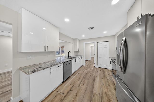 1451 SE Grapeland Avenue, Port St. Lucie, FL 34952