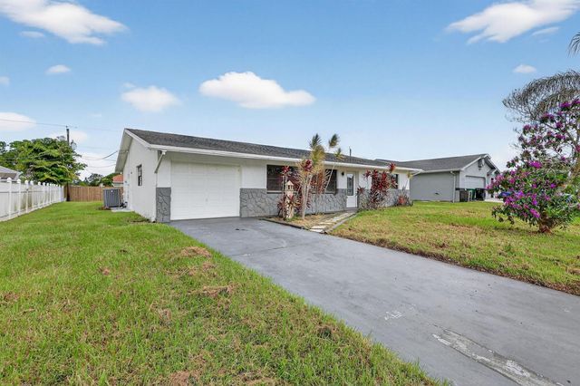 143 SW Grove Avenue, Port St. Lucie, FL 34983