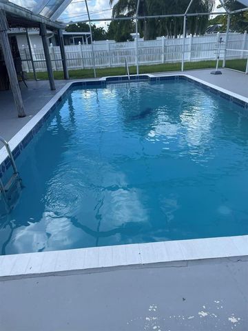 143 SW Grove Avenue, Port St. Lucie, FL 34983