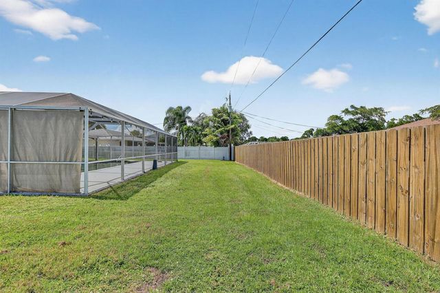 143 SW Grove Avenue, Port St. Lucie, FL 34983