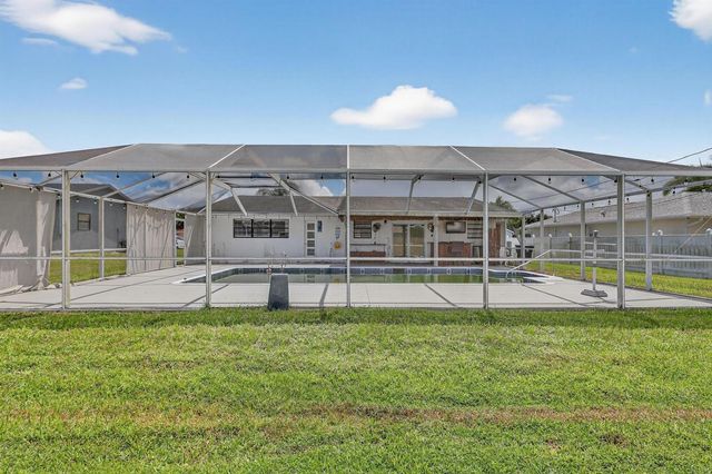 143 SW Grove Avenue, Port St. Lucie, FL 34983