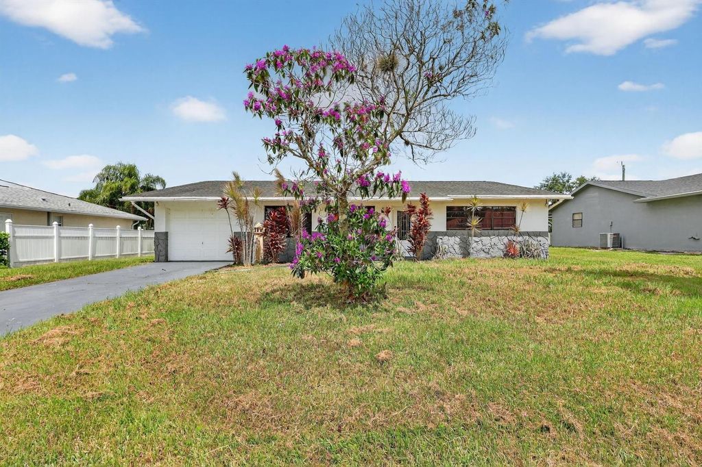 143 SW Grove Avenue, Port St. Lucie, FL 34983