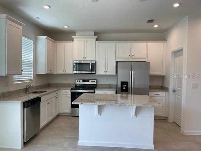 1136 LAKESHORE BREEZE PLACE, Kissimmee, FL 34747