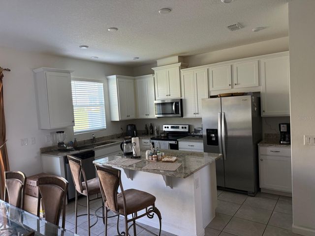 1136 LAKESHORE BREEZE PLACE, Kissimmee, FL 34747