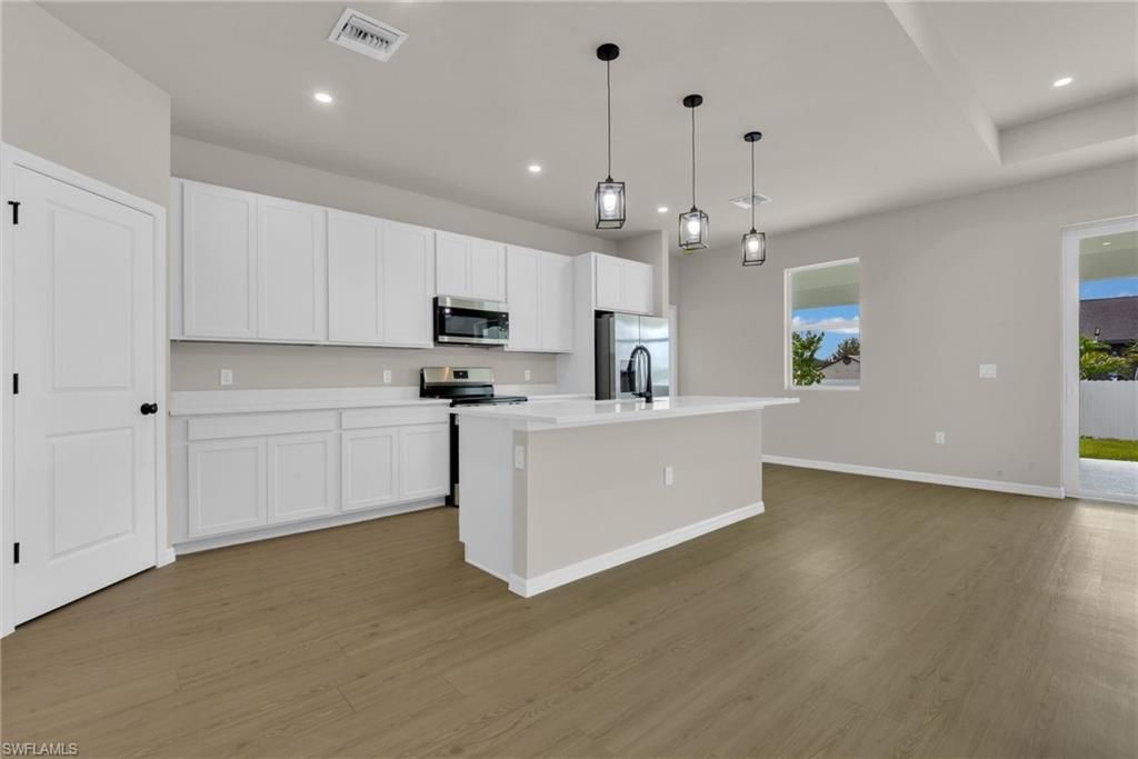 130 NE 25th ST, CAPE CORAL, FL 33909 — photo 4
