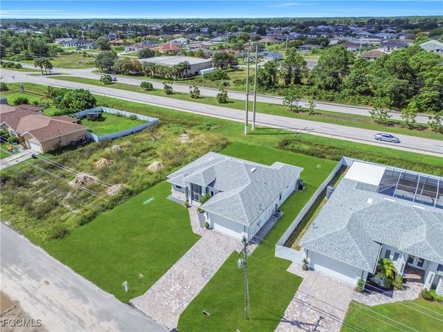 1106 FLOYD AVE S, Lehigh Acres, FL 33976