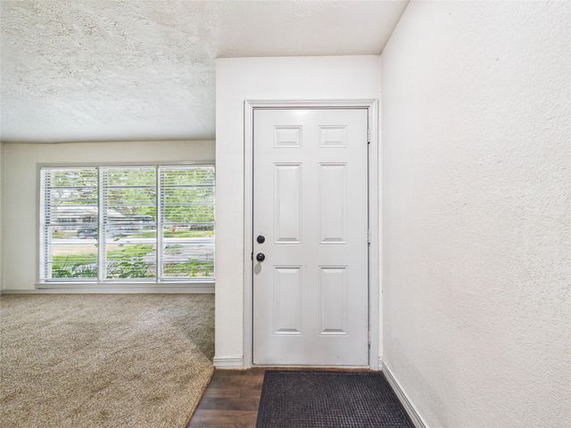 302 Sycamore Drive, Hitchcock, TX 77563