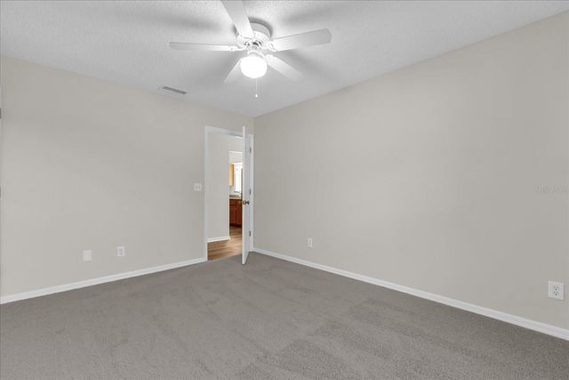 9028 VILLAGE GREEN BOULEVARD, Clermont, FL 34711