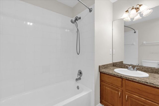 9028 VILLAGE GREEN BOULEVARD, Clermont, FL 34711