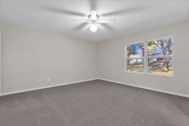 9028 VILLAGE GREEN BOULEVARD, Clermont, FL 34711