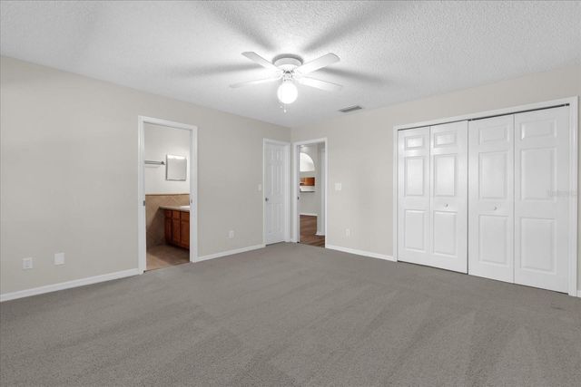 9028 VILLAGE GREEN BOULEVARD, Clermont, FL 34711