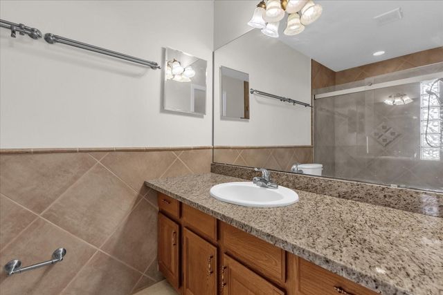 9028 VILLAGE GREEN BOULEVARD, Clermont, FL 34711