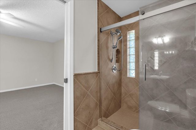 9028 VILLAGE GREEN BOULEVARD, Clermont, FL 34711