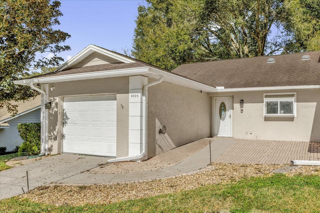 9028 VILLAGE GREEN BOULEVARD, Clermont, FL 34711