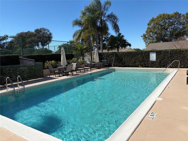 9028 VILLAGE GREEN BOULEVARD, Clermont, FL 34711