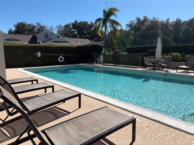 9028 VILLAGE GREEN BOULEVARD, Clermont, FL 34711