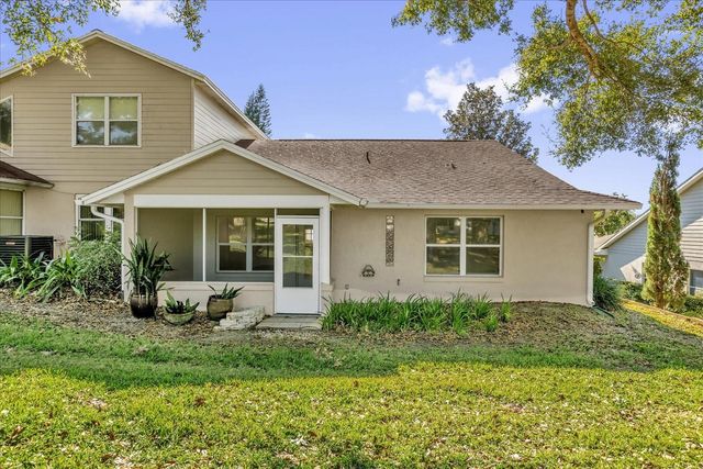 9028 VILLAGE GREEN BOULEVARD, Clermont, FL 34711