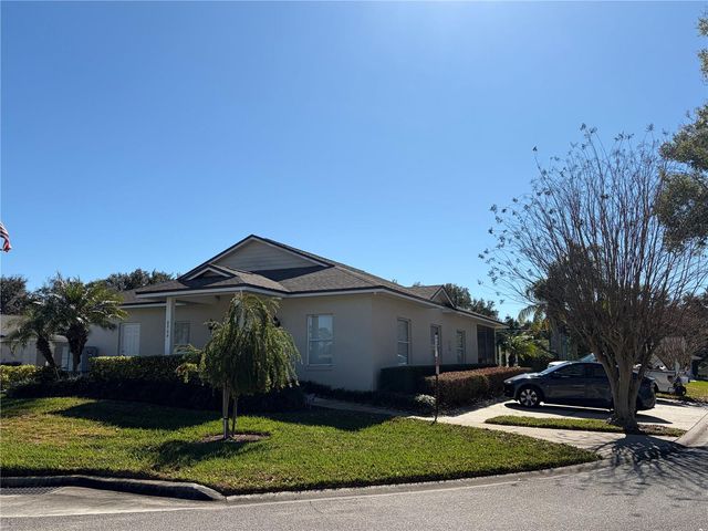 9028 VILLAGE GREEN BOULEVARD, Clermont, FL 34711