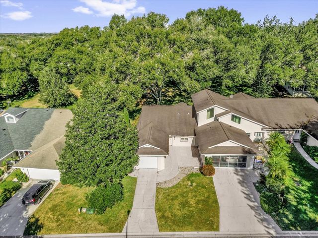 9028 VILLAGE GREEN BOULEVARD, Clermont, FL 34711