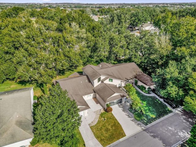 9028 VILLAGE GREEN BOULEVARD, Clermont, FL 34711