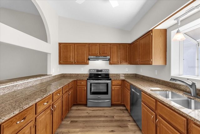 9028 VILLAGE GREEN BOULEVARD, Clermont, FL 34711