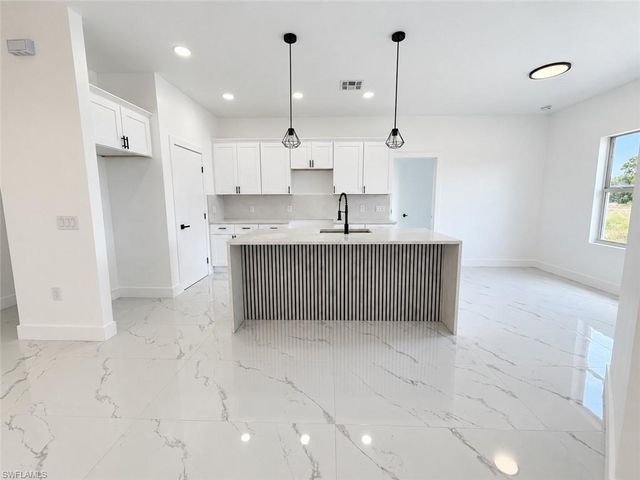 1142 Ebert ST E, Lehigh Acres, FL 33974