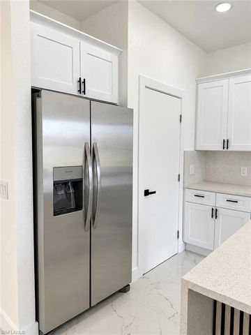 1142 Ebert ST E, Lehigh Acres, FL 33974