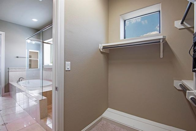 9948 Woodwind Lane N, Houston, TX 77025