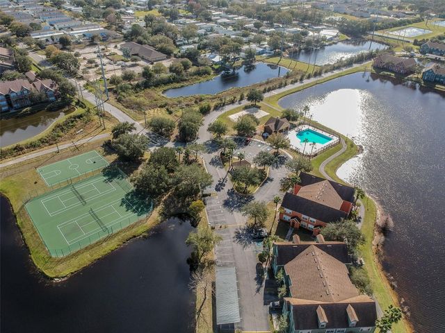 9064 LAKE CHASE ISLAND WAY, Tampa, FL 33626
