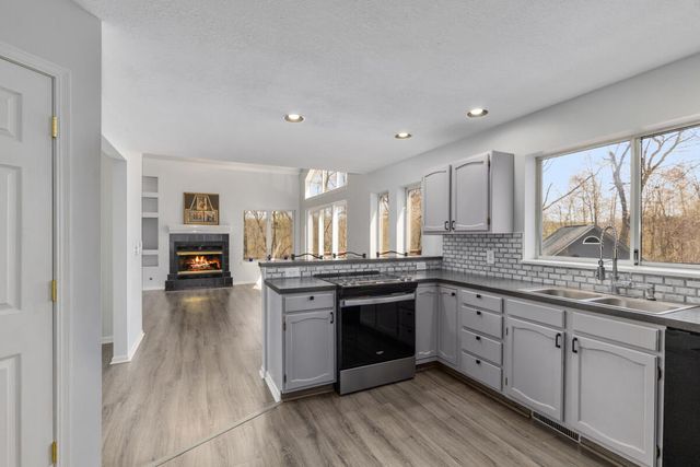 7721 Sun Quest Ridge Drive, Ada, MI 49301