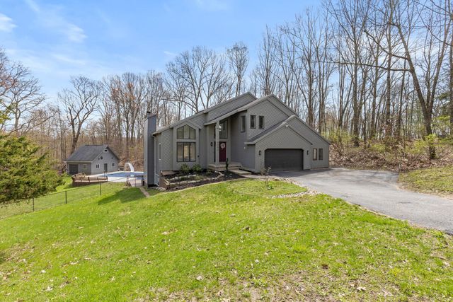 7721 Sun Quest Ridge Drive, Ada, MI 49301