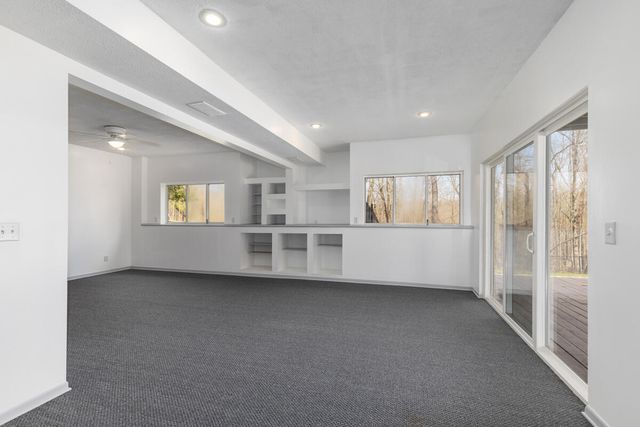 7721 Sun Quest Ridge Drive, Ada, MI 49301