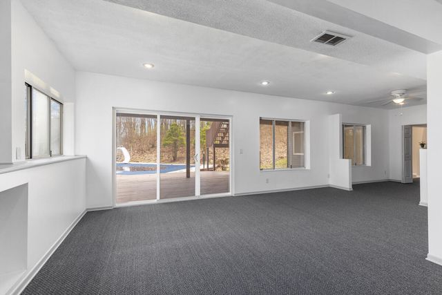 7721 Sun Quest Ridge Drive, Ada, MI 49301